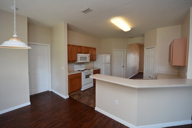 Building Photo - "Spacious 4-Bed Oasis in Palm Coast with 2...