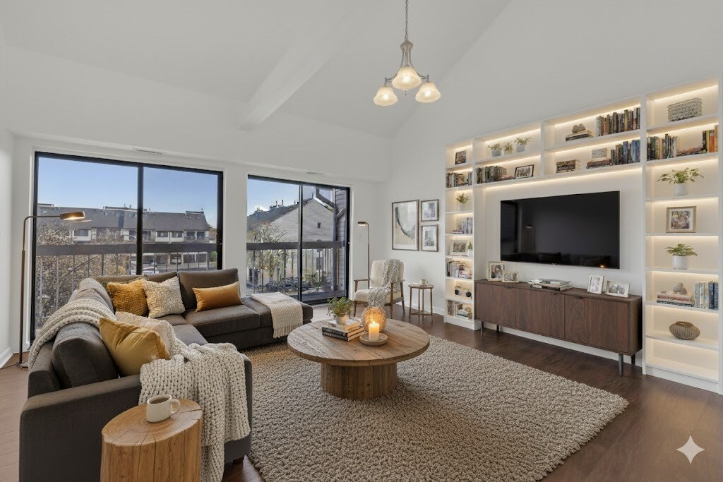 Spacious living room digitally staged, featuring sliders that open to a private patio. - 3320 Richmond Ct