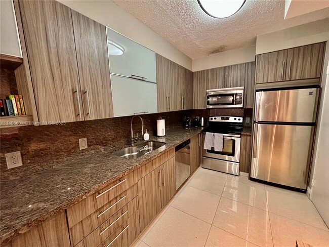 Building Photo - 10185 Collins Ave