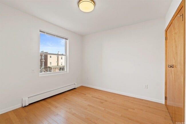 Building Photo - 32-33-33 46th St