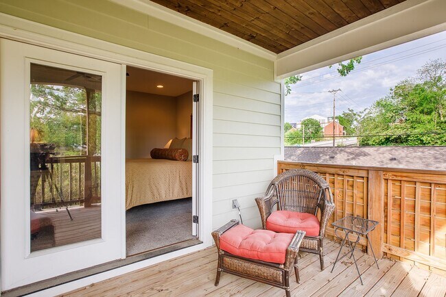 Building Photo - Beautiful Sylvan Park Home with Screened Porch & Outdoor Stone Fireplace