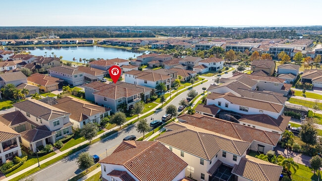 Building Photo - Luxury 5-Bedroom Residence in Eagle Creek with Indoor-Outdoor Living