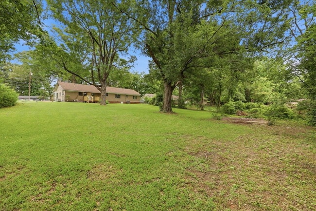 Building Photo - Spacious 4BR Home in Clinton School District with Multiple Living Areas