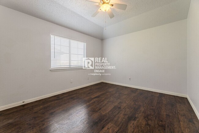 Building Photo - Recently Updated Plano Property with Modern Features and Serene Surroundings