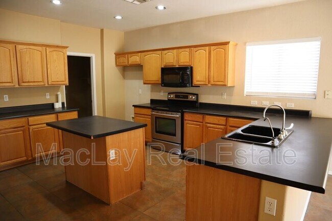 Building Photo - 9465 E Lompoc Ave