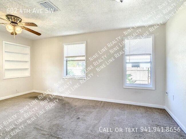 Building Photo - 602 4th Ave SW