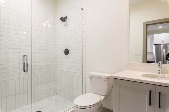 Building Photo - Modern Living Meets Walkable City Charm in...
