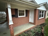 Building Photo - Updated 4BR Home with Finished Basement & Level Yard