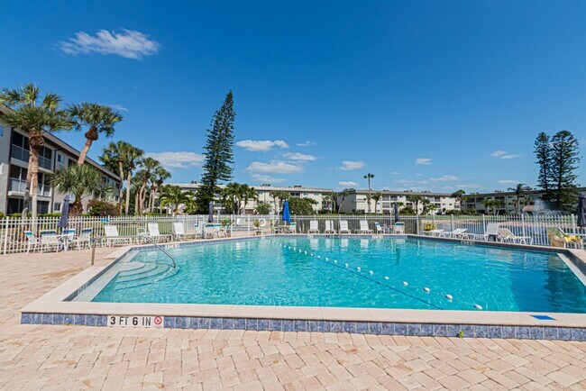 Building Photo - AVAILABLE NOW! Furnished Ground-Floor End Unit | Lake & Pool Views | Minutes to Marco Island & Do...
