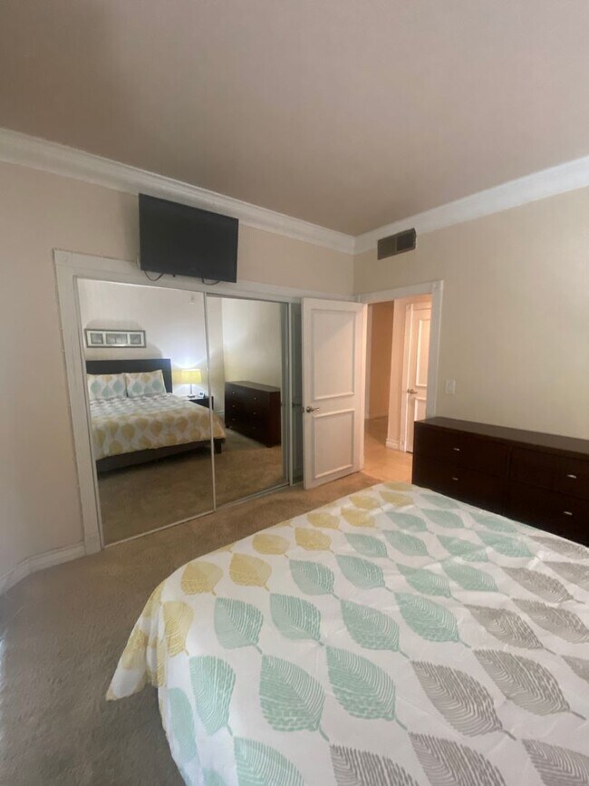 Building Photo - Long or short term available!  Live in lux...
