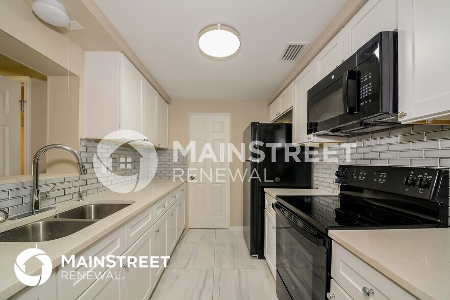 Building Photo - 703 59th Ave Terrace W