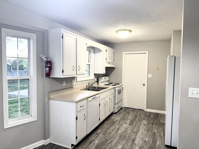 Building Photo - Cathedral Ceiling for a big open feel!