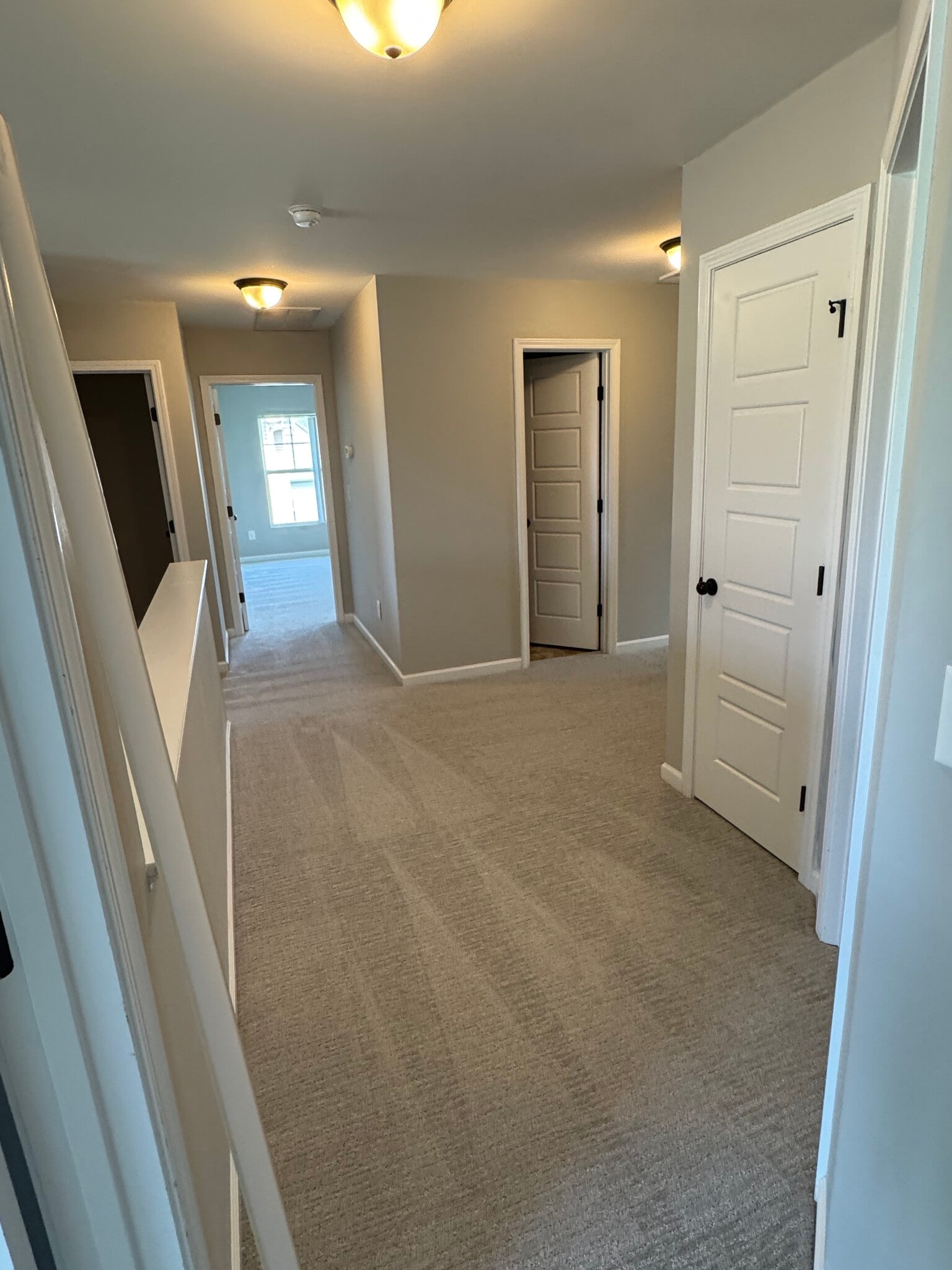 hallway from 4th bedroom - 100 Pine Lakes Drive