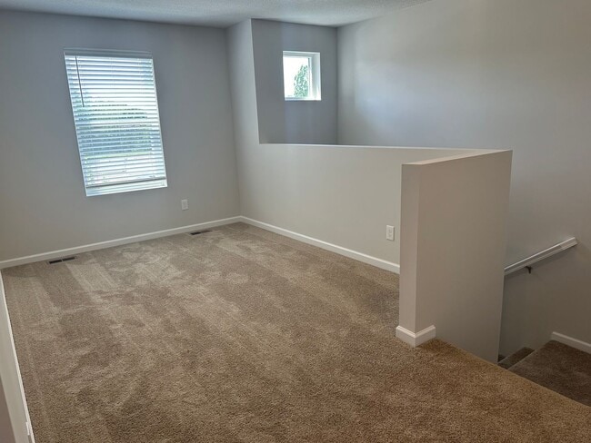 Building Photo - 3 Bed +Den Nearly Brand New $2350