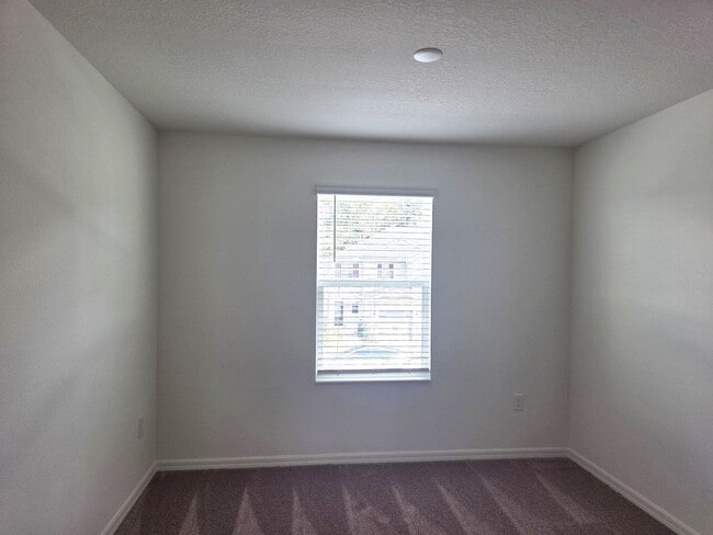 Building Photo - Brand New Townhome in The Sanctuary