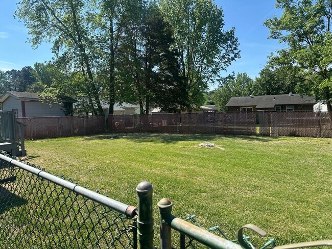 Building Photo - Durham Gem with Fenced Yard & Deck