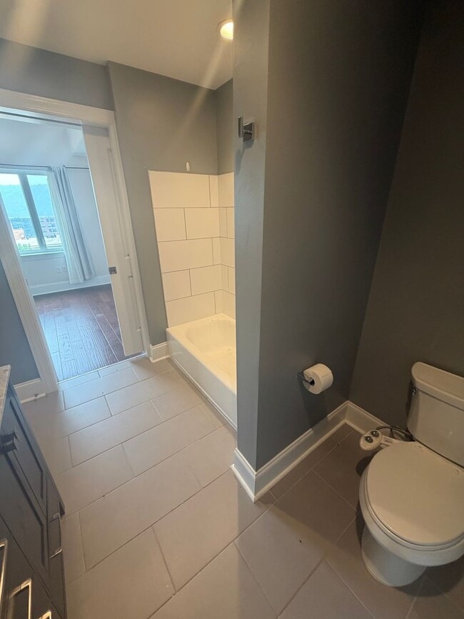 Building Photo - Luxury 3 Bedroom Condo in the Heart of Lawrenceville
