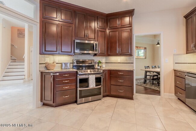 Building Photo - 8543 Glenbury Ct N