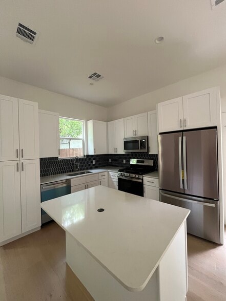 Pop-Up Outlet in Kitchen Island - 500 Capitol Dr