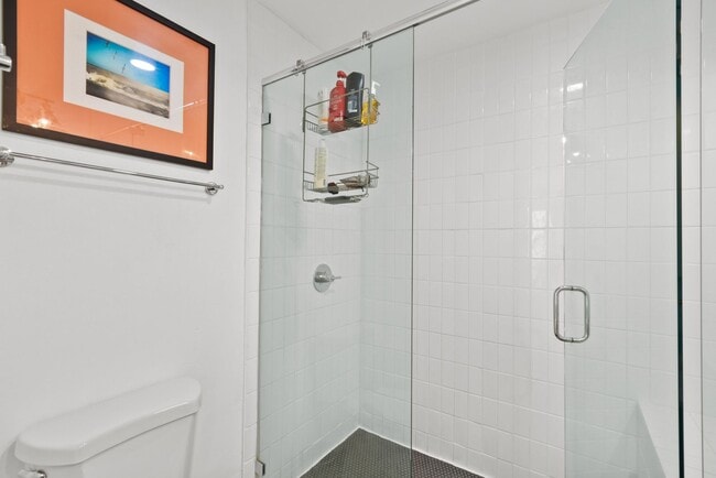 Building Photo - Modern Living Meets Urban Charm in Bankers...