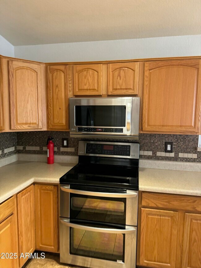 Building Photo - 11448 E Petra Ave