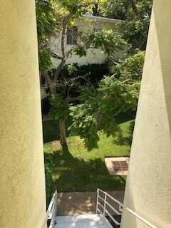 backdoor to the courtyard - 637 Levering Ave
