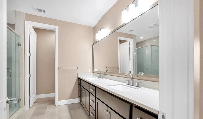 Primary bathroom with double vanity - 138 Summit Way