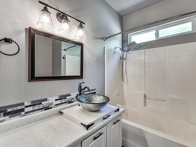Building Photo - "Charming 4-Bed Oasis with Elegant Hardwoo...