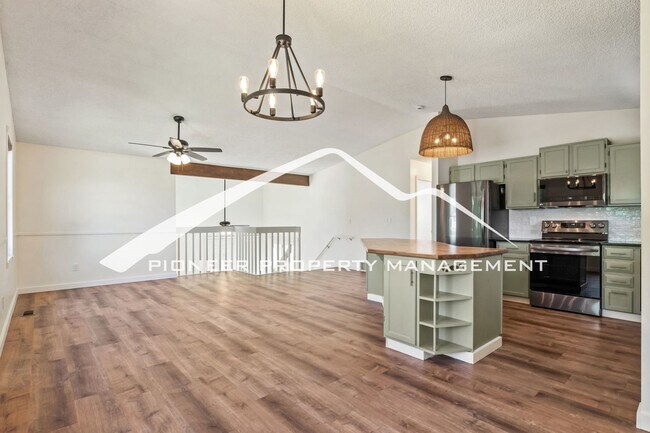 Building Photo - Updated 4 Bed, 2 Bath Home in Briargate with Mountain Views, fully fenced yard, 2 car garage and AC