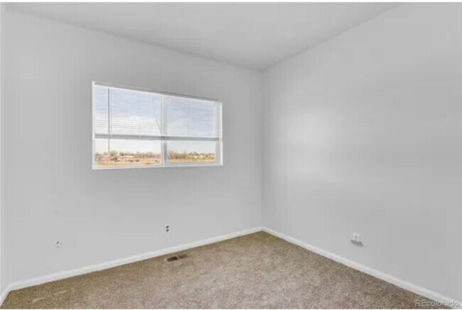 Building Photo - 2209 E 111th Dr