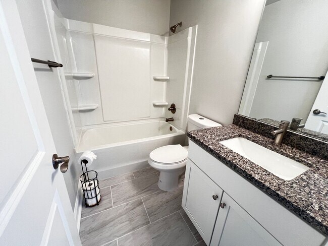 Building Photo - Available Now! - Pet Friendly 2 Bedroom, 2.5 Bath Townhome at Market Common! Cable and Internet I...