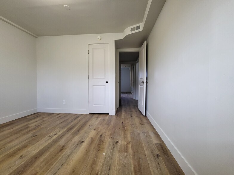 basement bedroom facing the backyard (the window is above the ground level) - 3224 S Verdant Cir
