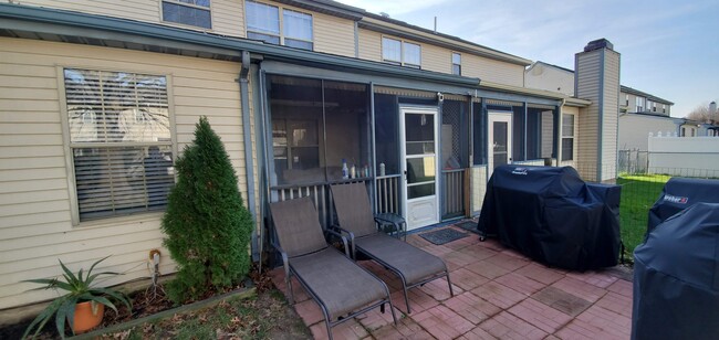 Rear of Home with porch leading to yard - 1359 Apple Blossom Dr