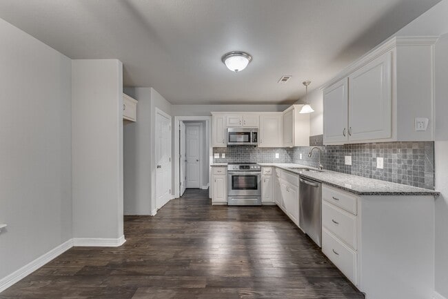 Building Photo - Charming 3-Bedroom Home with Fireplace & A...