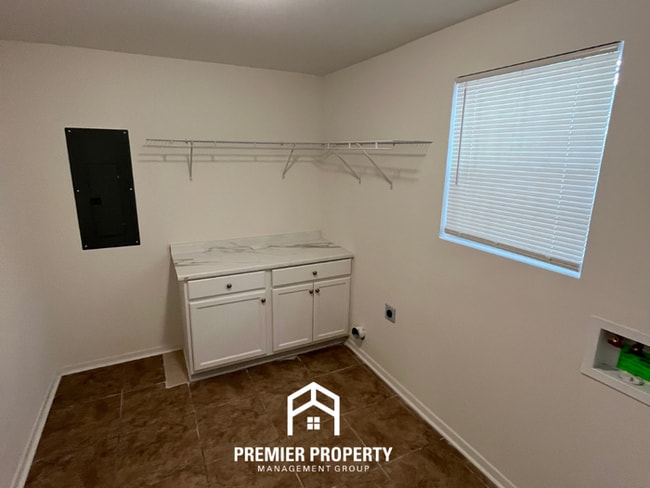 Building Photo - Spacious 3BR/2BA Home with Den & Living Room | Brick Fireplace & Large Yard
