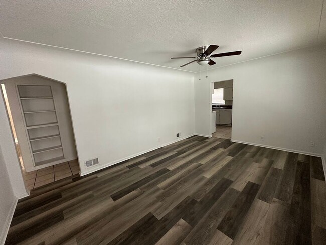 Building Photo - Spacious 4 Bedroom Home | 2 Living Rooms | Large Fenced Yard | 1,700+ Sq Ft