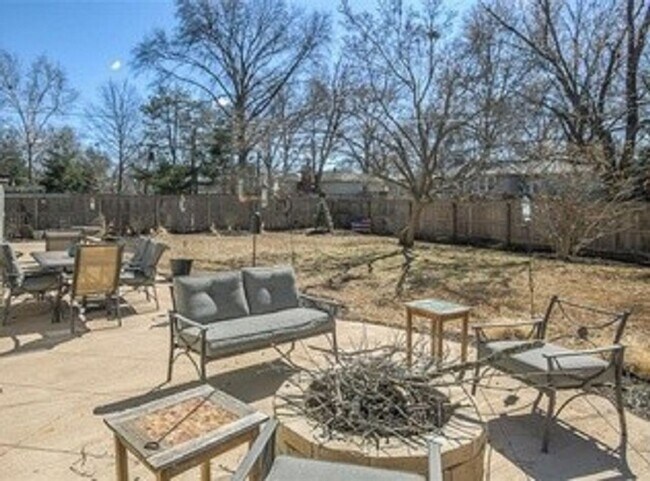 Building Photo - {5611} Updated OP Ranch + Two Car Garage + Fenced Yard and Stamped Concrete Patio Perfect for Spr...