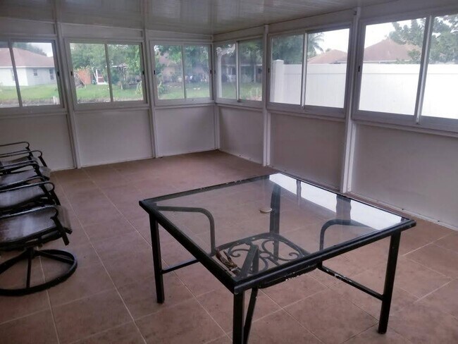 Spacious patio with view of the water - 10081 Boynton Place Cir