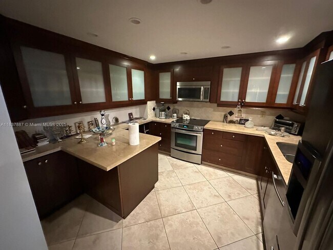 Building Photo - 9801 Collins Ave