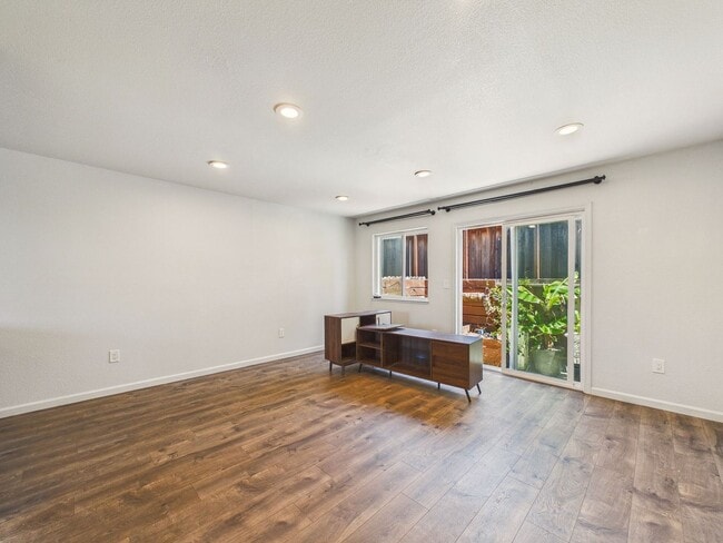 Building Photo - Updated 2 Bed / 1.5 Bath Townhome – In-Unit Washer & Dryer + Garage Parking – $2,700/month