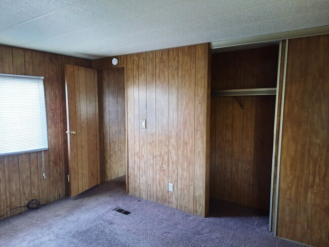 Building Photo - 2 Bedroom/2Bath Mobile home with Arizona Room and Fully Fenced Yard.