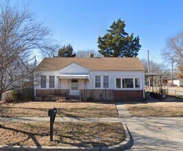 Building Photo - $1245 - 4 bedroom / 1 bathroom - Beautiful...
