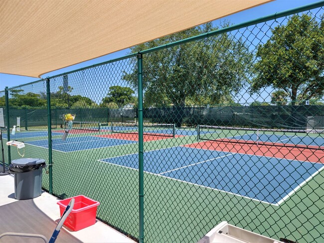 Building Photo - Bird Bay Village Annual Rental – Furnished 1st Floor Unit with Covered Parking