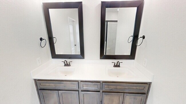 Building Photo - Welcome home to this beautifully designed 4-bedroom, 2.5-bathroom gem!