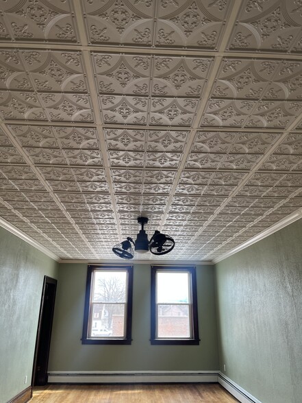 Living room tiled & coved ceiling - 415 E Saint Germain St