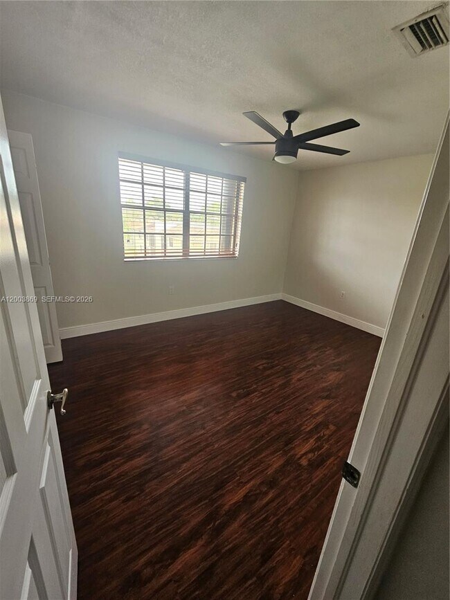 Building Photo - 9846 Hammocks Blvd