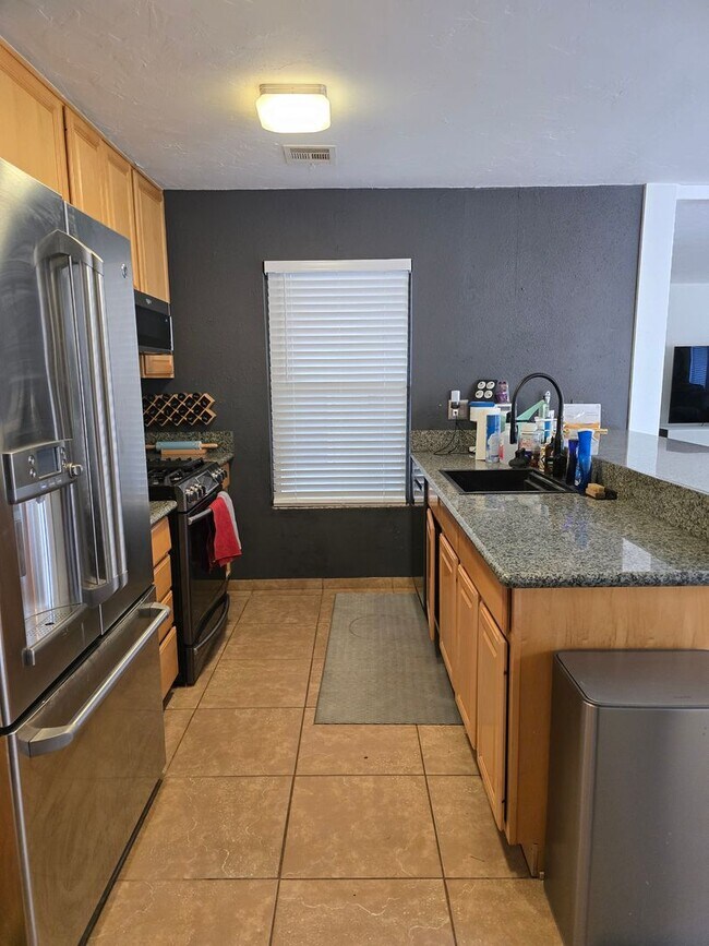 Building Photo - Furnished, 1-Year Long-Term Rental