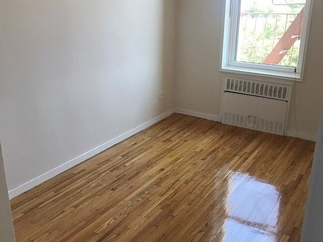 Primary Photo - "Charming 1-Bedroom Haven with Granite Touches & Gleaming Hardwood - 800 Sq Ft Gem in The Bronx!"