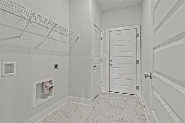 Building Photo - Discover this beautiful new townhome in th...