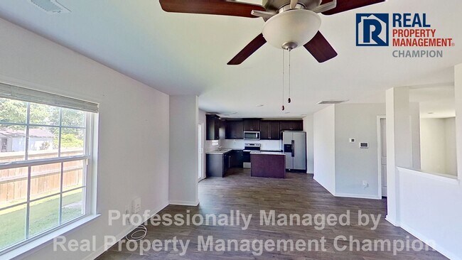 Building Photo - Spacious Home w/Open Living, Fireplace, Fenced Yard & Solar Panels